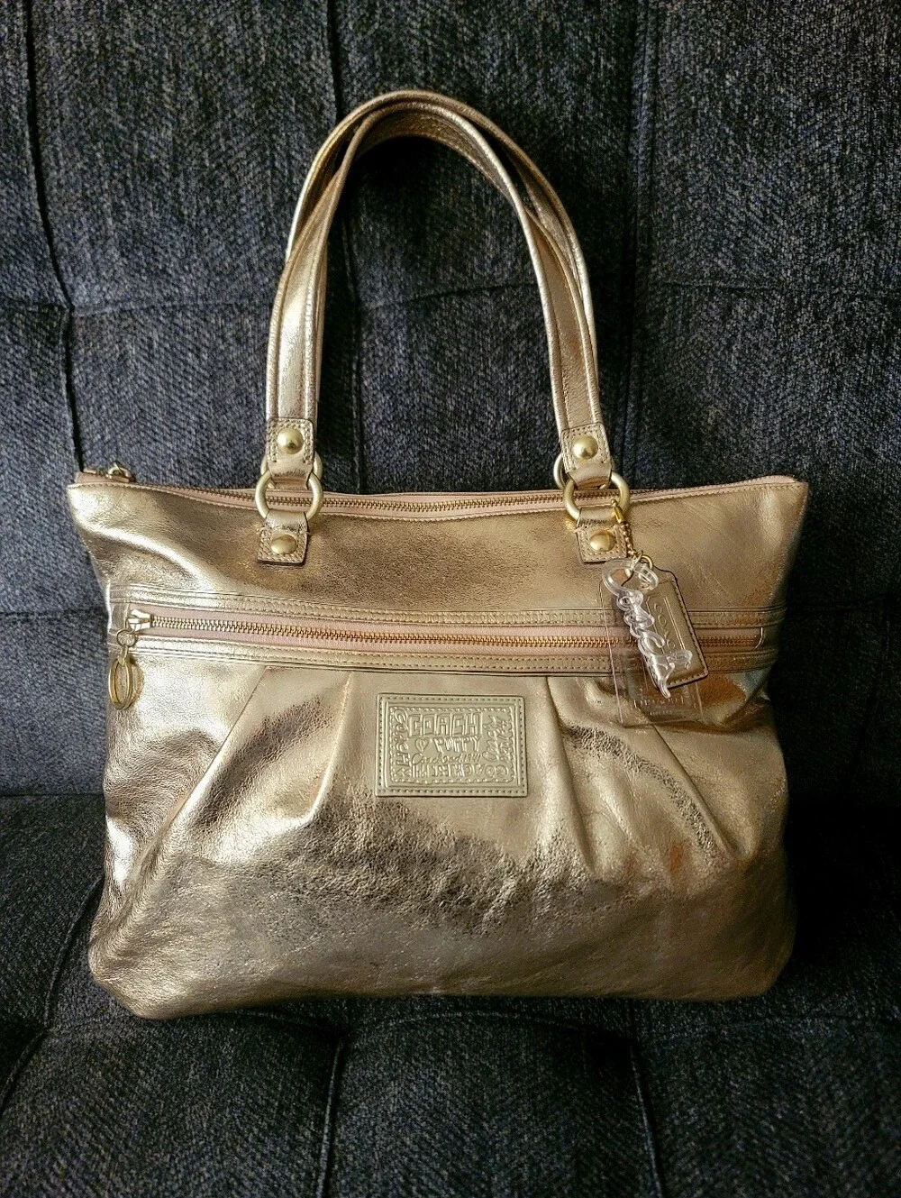 Coach Poppy Metallic Gold Leather Tote With Cursive Coach Charm